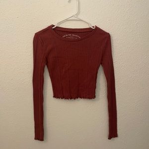 Long sleeve pumpkin color top
